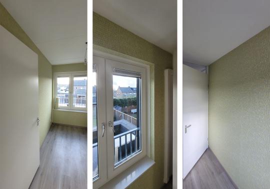 Vakman aan het werk met wandafwerking