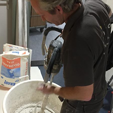 Glad pleisterwerk op wand